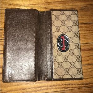 USED BROWN MONOGRAM TRIFOLD WALLET